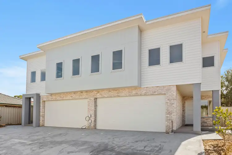 Main view of Homely townhouse listing, 2/16 Baragoot Road, Flinders NSW 2529