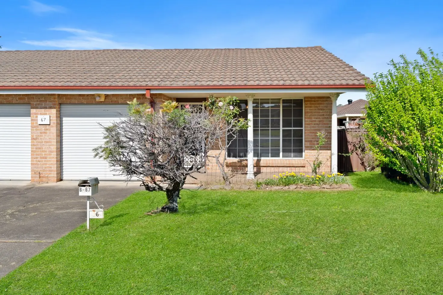 Main view of Homely villa listing, 6/67 Fuchsia Crescent, Macquarie Fields NSW 2564