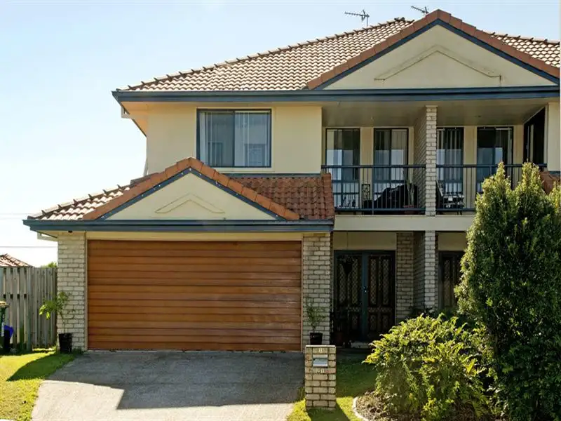 Main view of Homely townhouse listing, 1/21 McRae Cct, Pacific Pines QLD