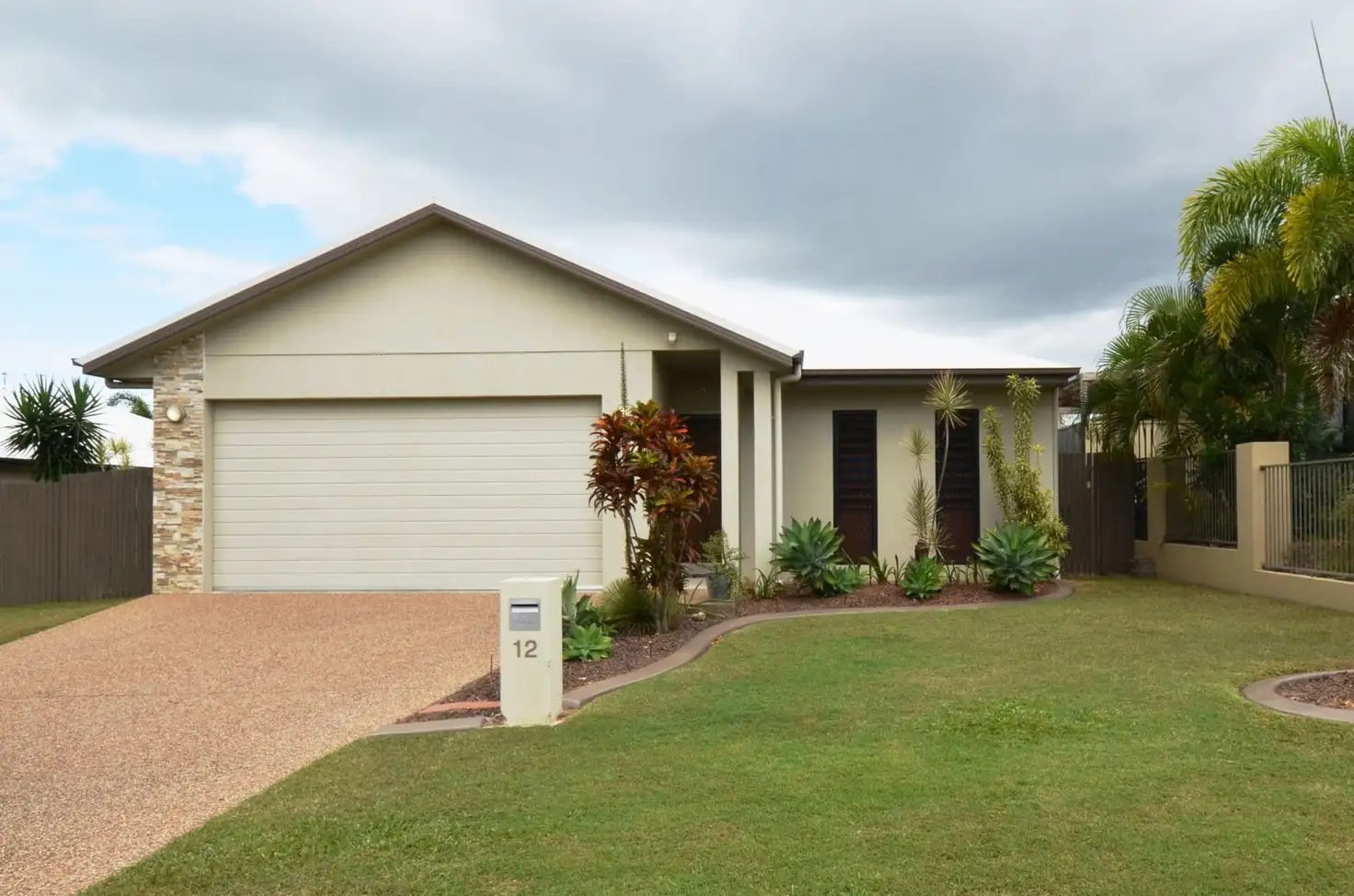 Main view of Homely house listing, 12 Channel Street, Bushland Beach QLD 4818