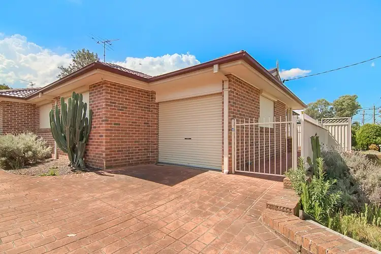 Main view of Homely villa listing, 1/102a Targo Road, Girraween NSW 2145
