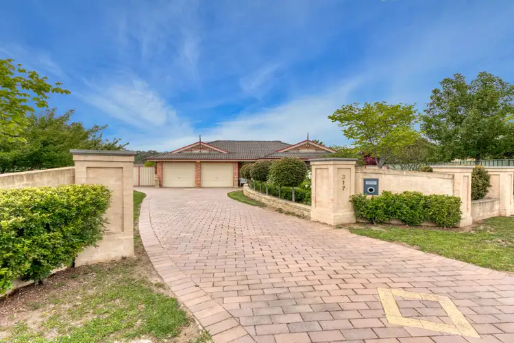 Second view of Homely house listing, 317 Thirlmere Way, Thirlmere NSW 2572