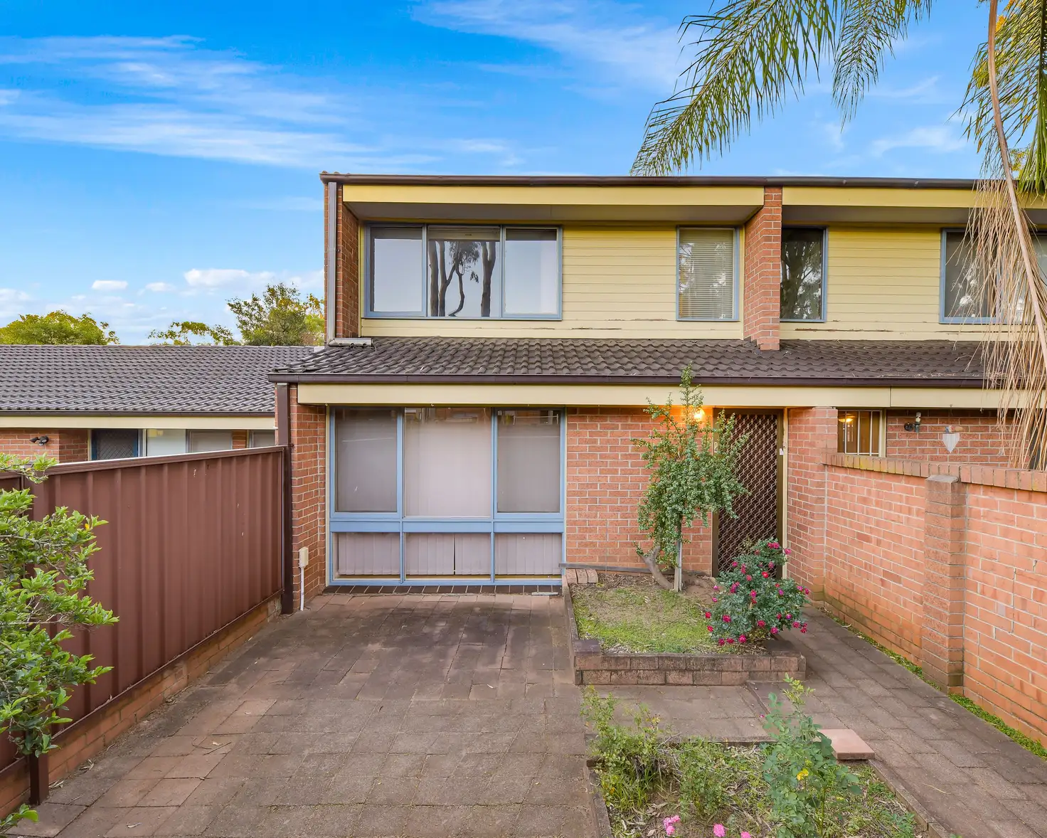 Main view of Homely townhouse listing, 14/15-19 Fourth Avenue, Macquarie Fields NSW 2564