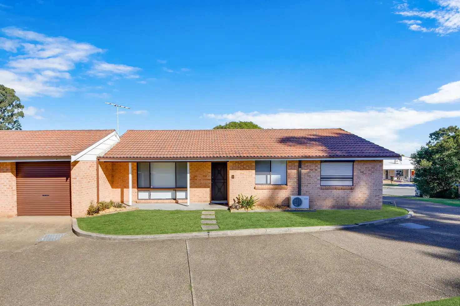 Main view of Homely villa listing, 1/21 Lagonda Drive, Ingleburn NSW 2565