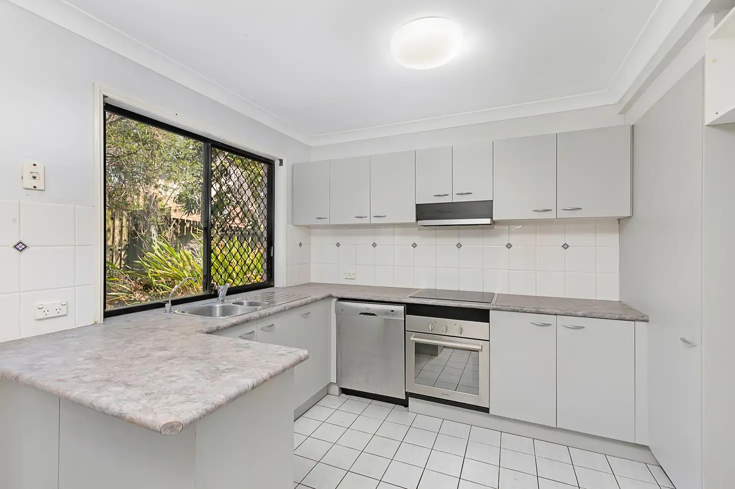 Main view of Homely townhouse listing, 12/20 Hunter Street, Manly West QLD 4179