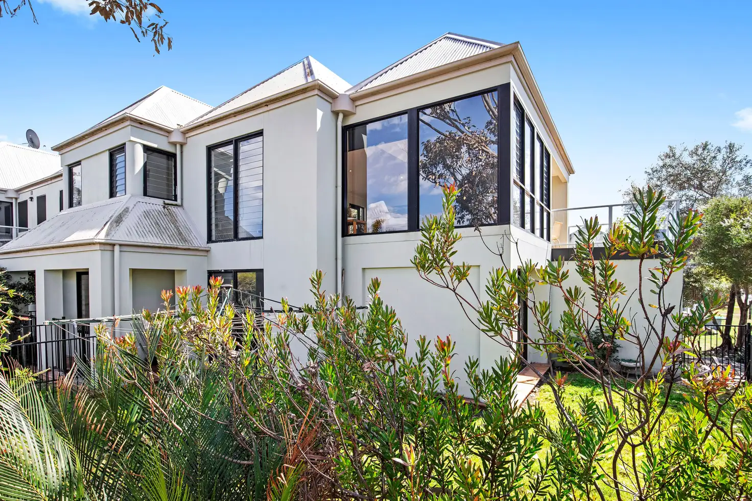 Main view of Homely semi-detached listing, 1/13 Coronation Drive, Broulee NSW 2537