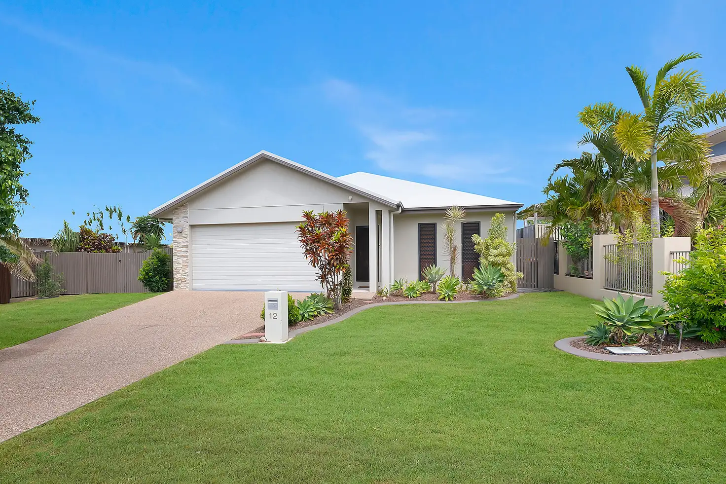 Main view of Homely house listing, 12 Channel Street, Bushland Beach QLD 4818