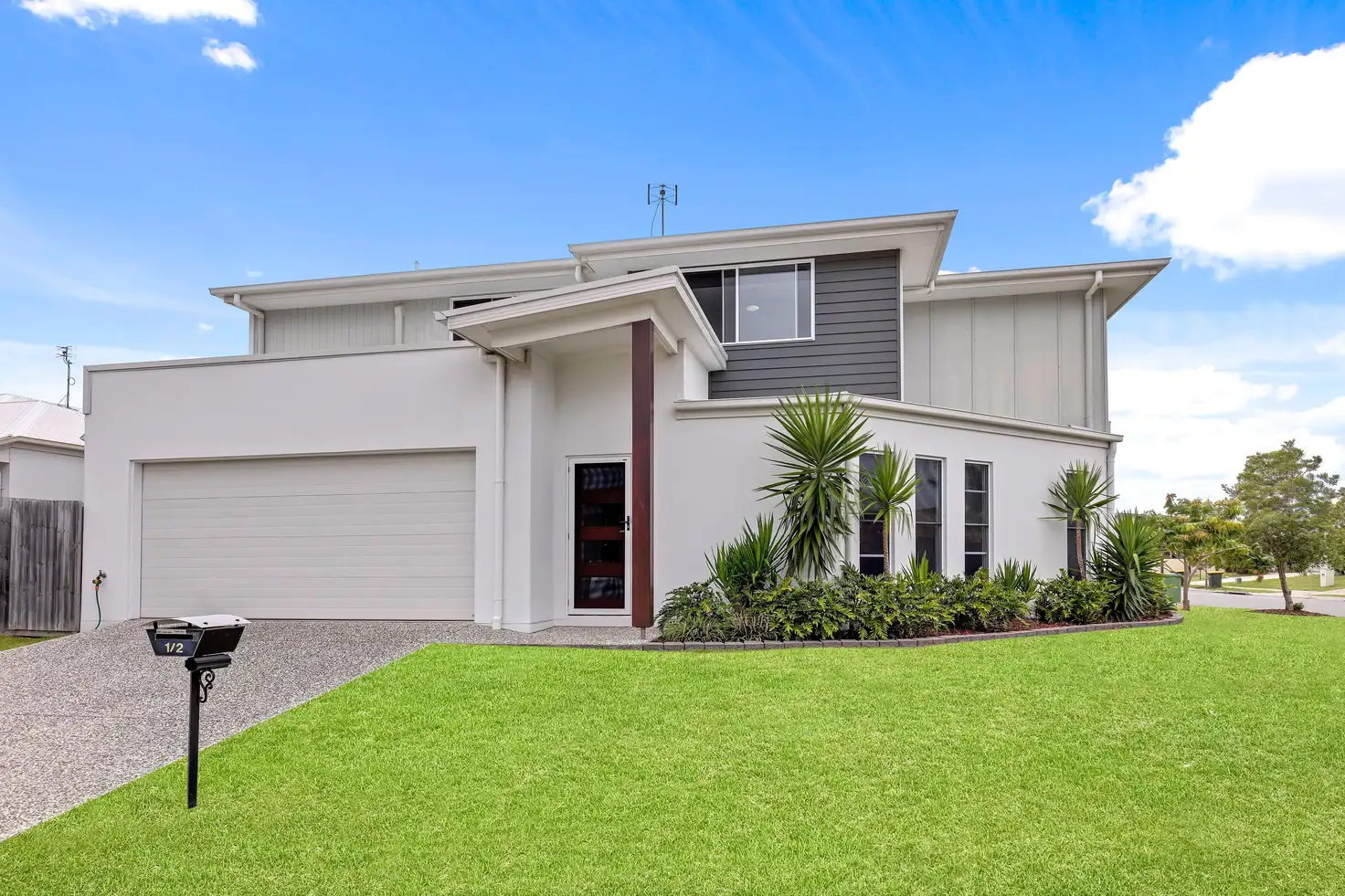 Main view of Homely semi-detached listing, 1/2 Lamatia Drive, Mountain Creek QLD 4557