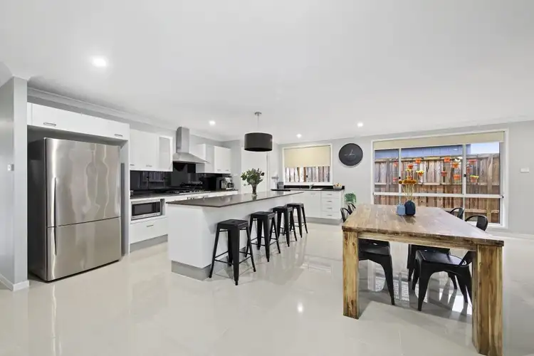 Second view of Homely house listing, 8 Tibin Drive, Fletcher NSW 2287