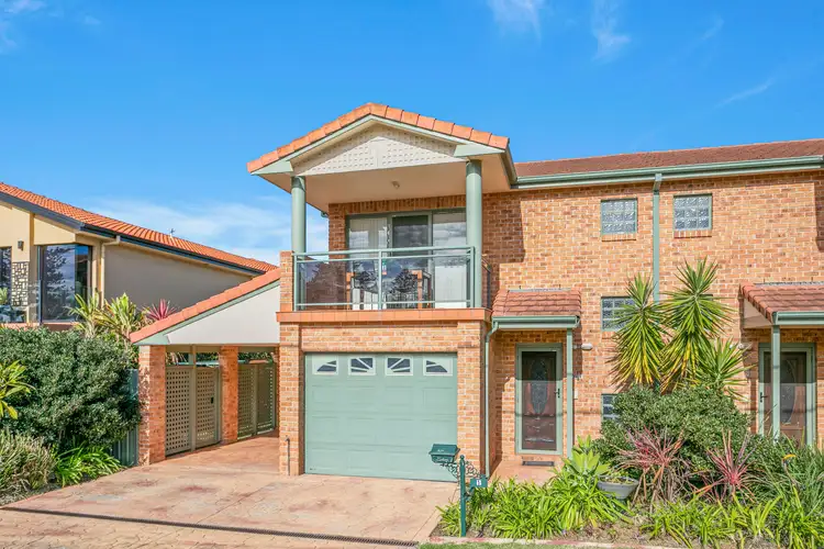 Main view of Homely townhouse listing, 1/9-11 Boollwarroo Parade, Shellharbour NSW 2529