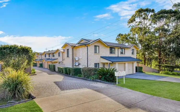 Main view of Homely townhouse listing, 1/10-14 Eagleview Road, Minto NSW 2566