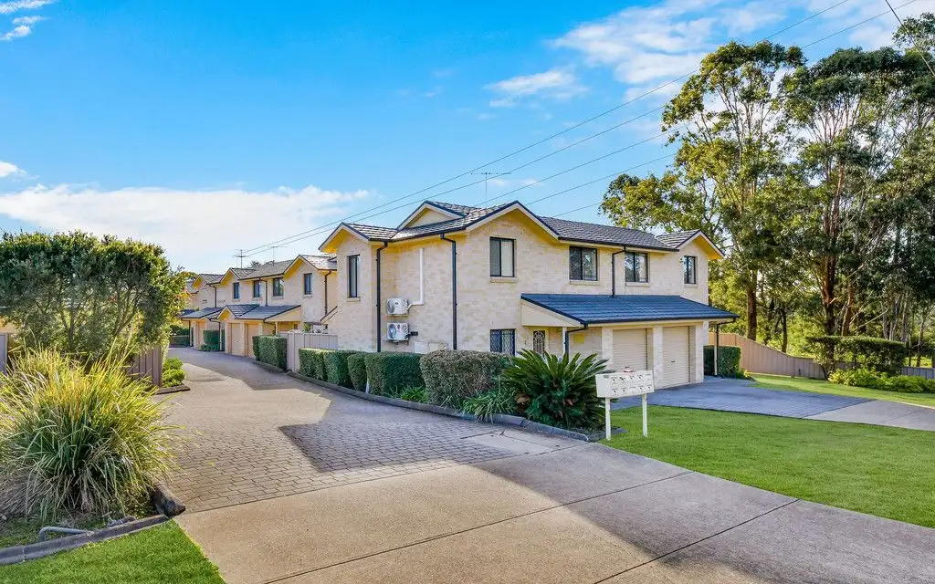 Main view of Homely townhouse listing, 1/10-14 Eagleview Road, Minto NSW 2566