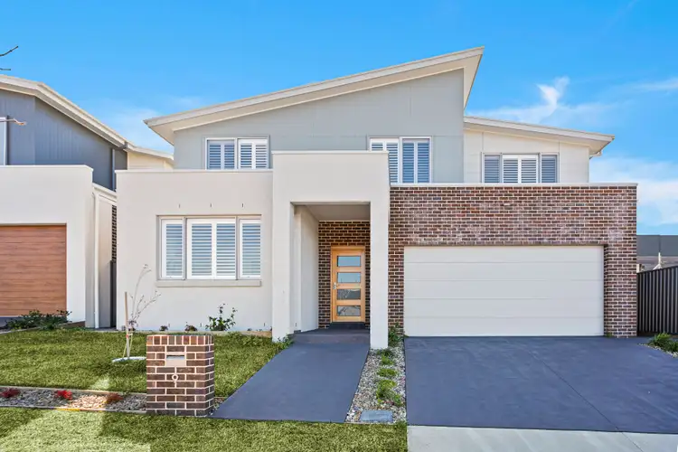 9 McNevin Close, Calderwood NSW 2527