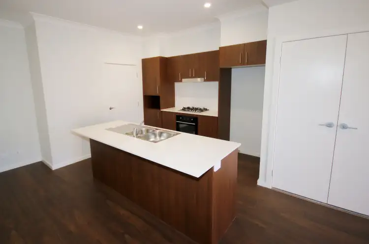 Third view of Homely townhouse listing, 1/4 Cassine Boulevard, Waratah West NSW 2298