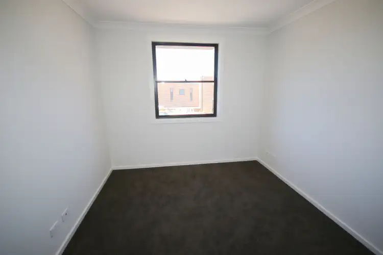 Seventh view of Homely townhouse listing, 1/4 Cassine Boulevard, Waratah West NSW 2298