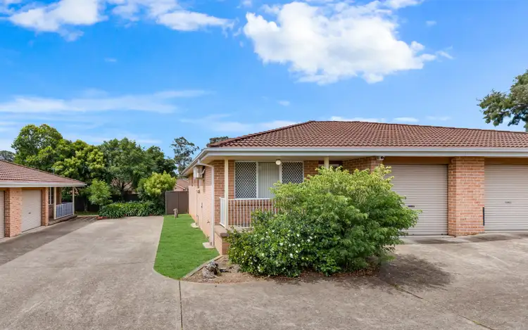 Main view of Homely villa listing, 4/4 Bensley Road, Macquarie Fields NSW 2564