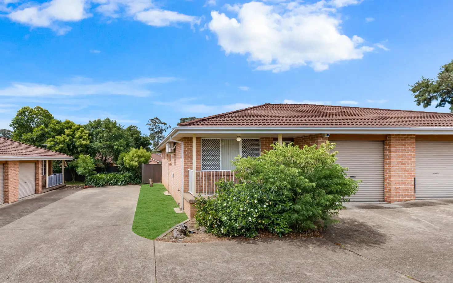 Main view of Homely villa listing, 4/4 Bensley Road, Macquarie Fields NSW 2564