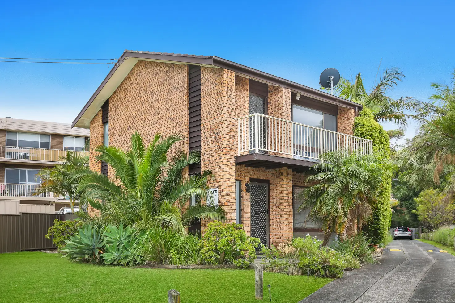 Main view of Homely townhouse listing, 1/15 Henley Road, Thirroul NSW 2515