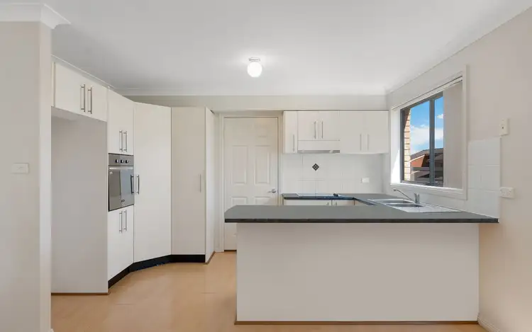 Sixth view of Homely townhouse listing, 1/67 Canterbury Road, Glenfield NSW 2167