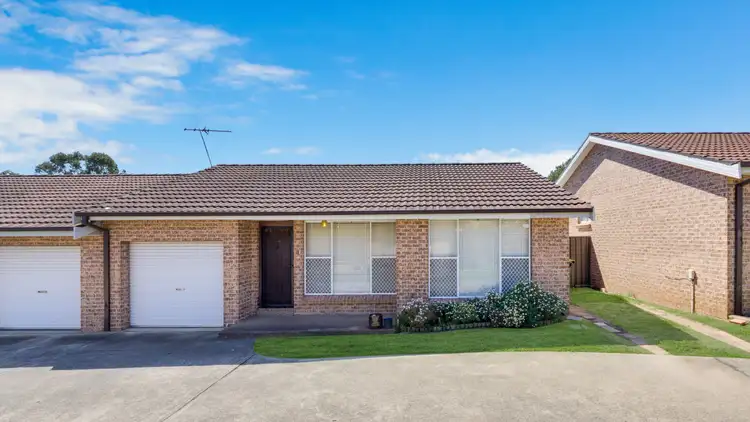 Main view of Homely villa listing, 4/6 Bensley Road, Macquarie Fields NSW 2564