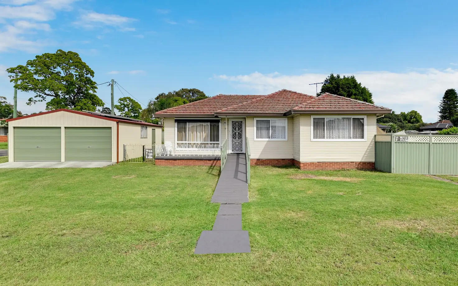 Main view of Homely house listing, 14 Wattle Avenue, Macquarie Fields NSW 2564