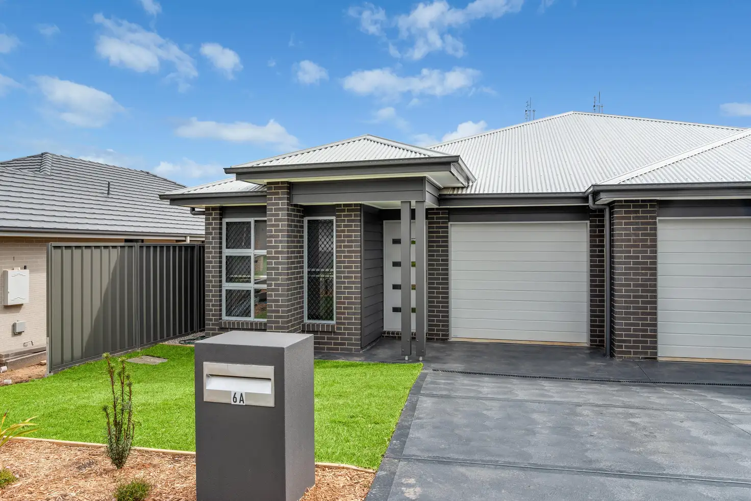 Main view of Homely semi-detached listing, 2/6 Sorbus Way, Gillieston Heights NSW 2321