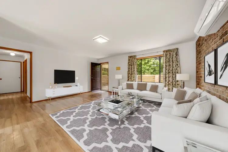 Main view of Homely semi-detached listing, 1/68 Twelvetrees Crescent, Florey ACT 2615