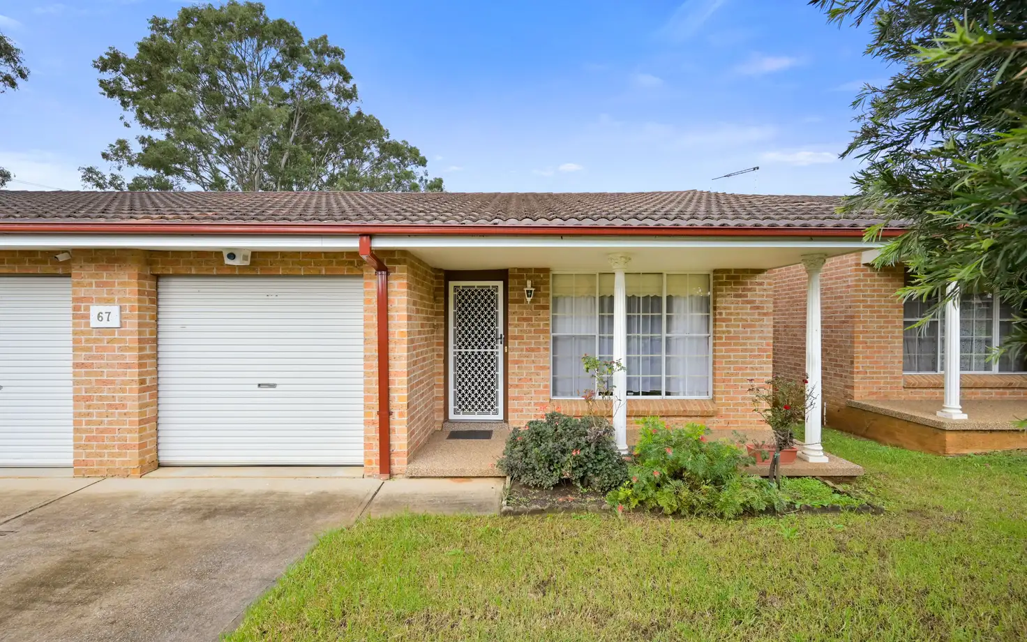 Main view of Homely villa listing, 2/67 Fuchsia Crescent, Macquarie Fields NSW 2564