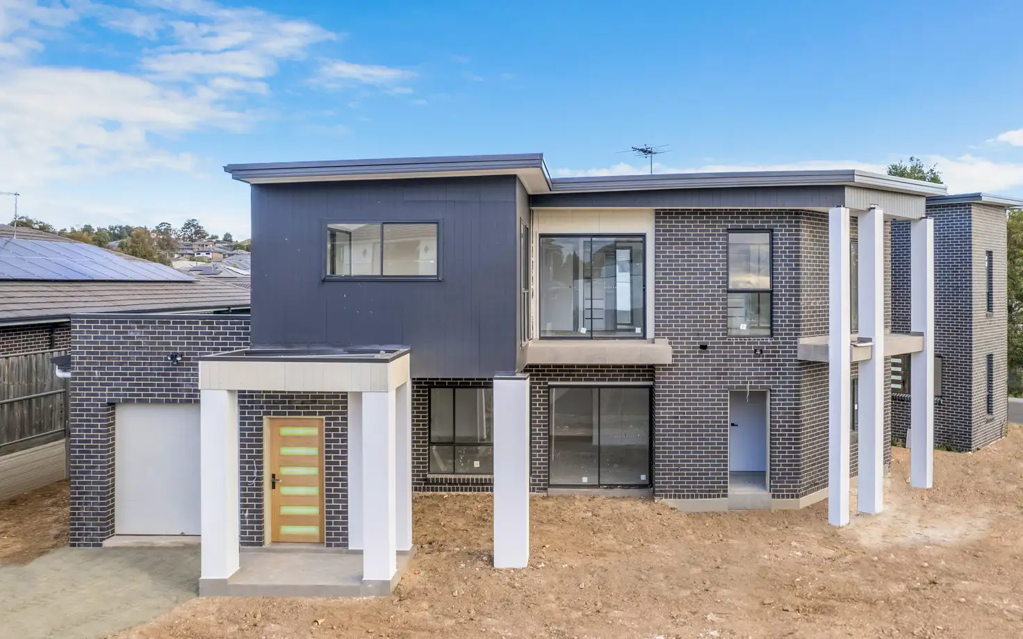 Main view of Homely townhouse listing, 2 Blue Street, Minto NSW 2566