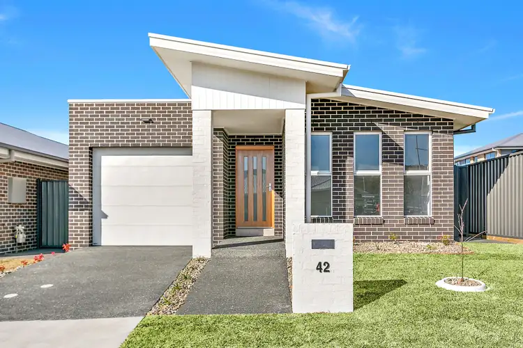 Main view of Homely house listing, 42 Wildflower Crescent, Calderwood NSW 2527