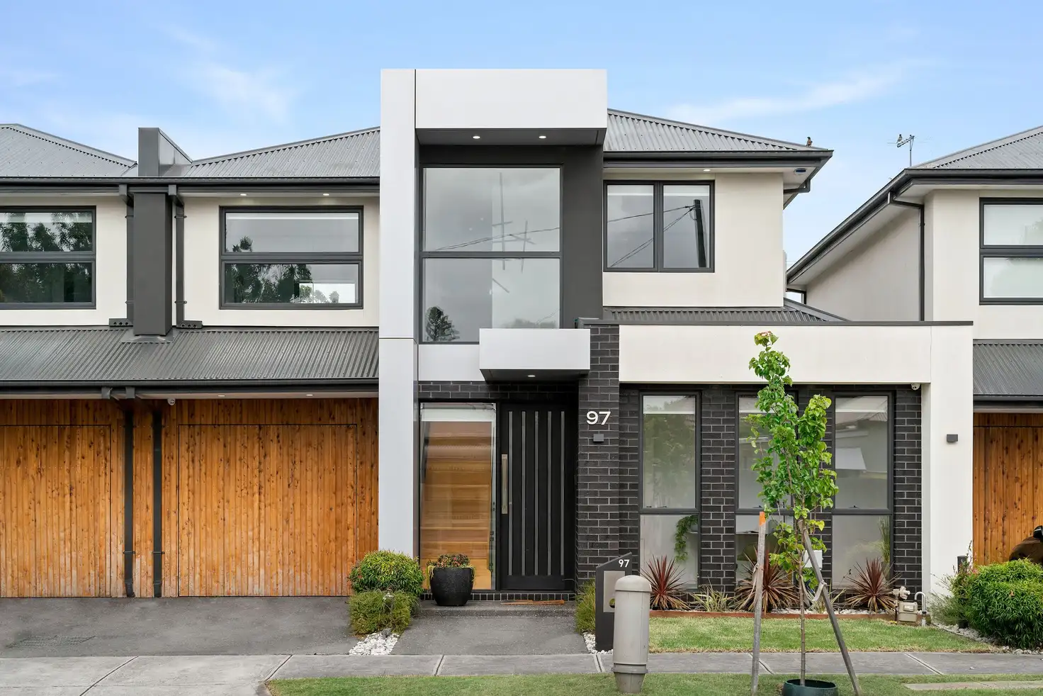 Main view of Homely townhouse listing, 97 Paxton Street, South Kingsville VIC 3015