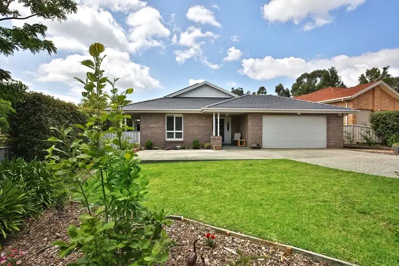 Main view of Homely house listing, 4 Magnolia Grove, Bomaderry NSW 2541
