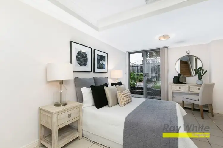 Main view of Homely townhouse listing, 2/9 Monmouth Street, Morningside QLD 4170