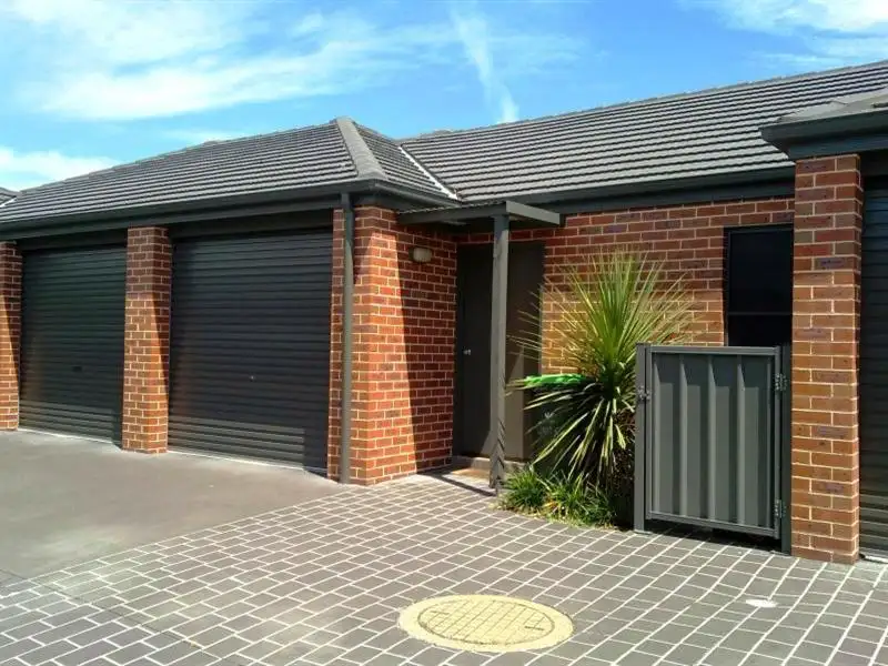 Main view of Homely villa listing, 6/57-59 Illowra Crescent, Primbee NSW 2502