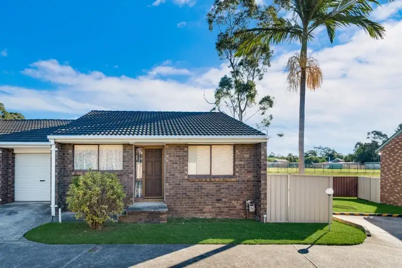 Main view of Homely villa listing, 7/16 Bensley Road, Macquarie Fields NSW 2564