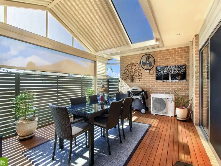 Main view of Homely villa listing, 4/121 Daintree Drive, Albion Park NSW 2527