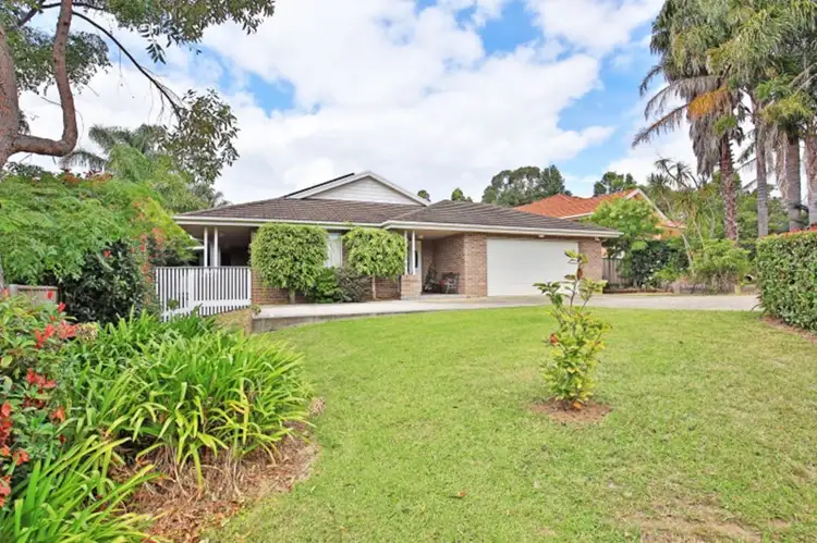 Main view of Homely house listing, 4 Magnolia Grove, Bomaderry NSW 2541