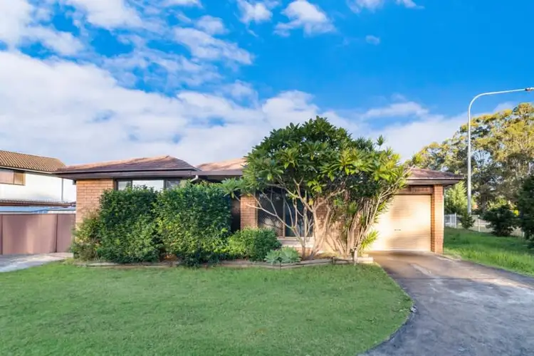 Main view of Homely villa listing, 1/1 Astelia Street, Macquarie Fields NSW 2564