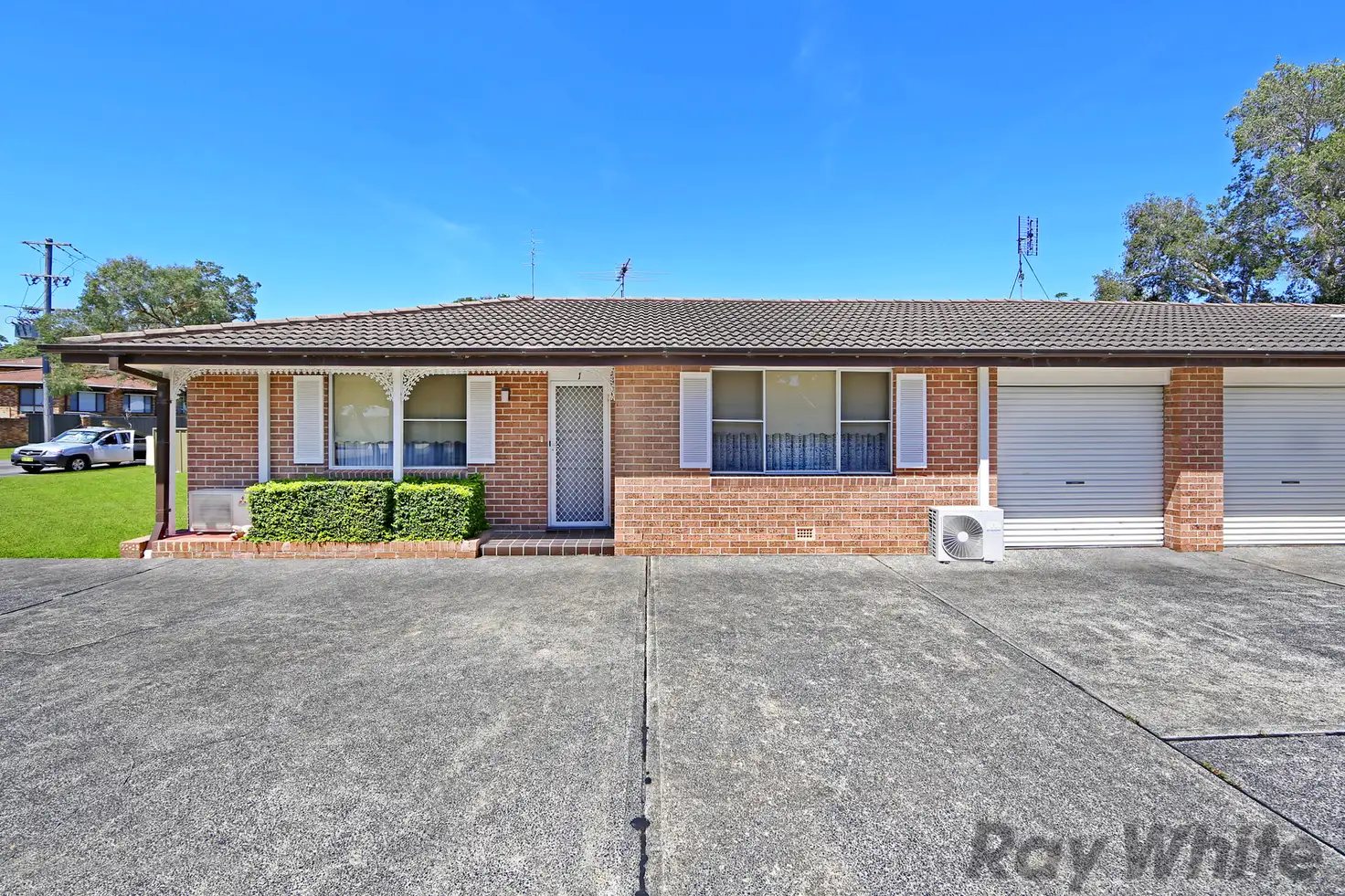 Main view of Homely townhouse listing, 1/30 Natuna Avenue, Budgewoi NSW 2262