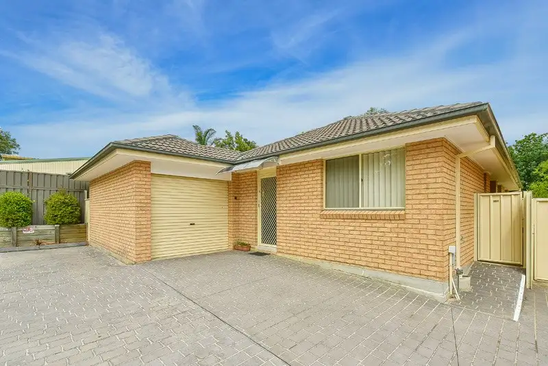 Main view of Homely villa listing, 4/13-15 Atchison Road, Macquarie Fields NSW 2564