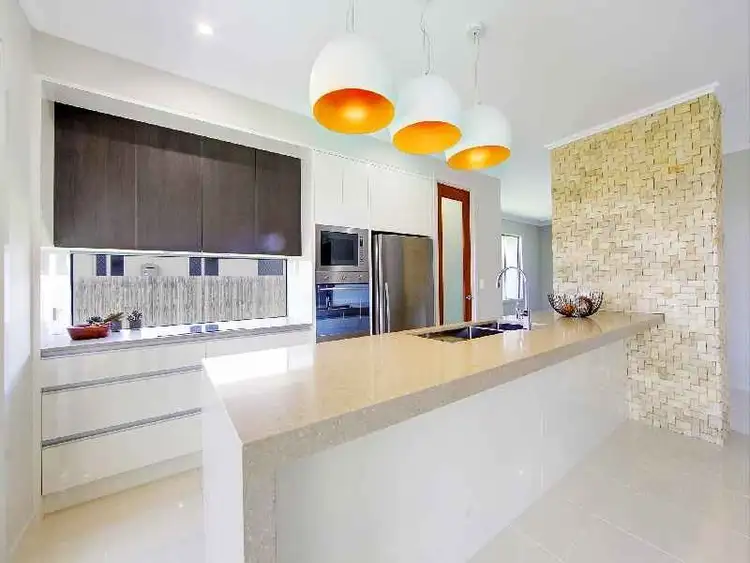 Third view of Homely house listing, 13 Westbrook Drive, Idalia QLD 4811
