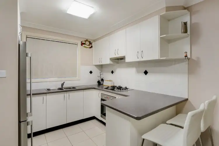 Third view of Homely townhouse listing, 1/9-11 Fourth Avenue, Macquarie Fields NSW 2564