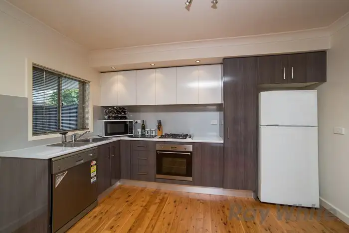 Main view of Homely villa listing, 1/67 Womboin Road, Lambton NSW 2299