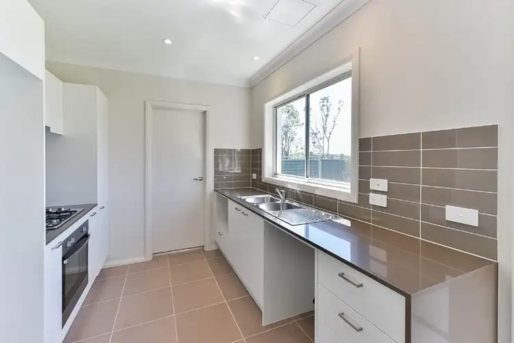 Third view of Homely townhouse listing, 37 Rolla Road, Glenfield NSW 2167