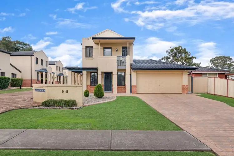 Main view of Homely townhouse listing, 1/9-11 Fourth Avenue, Macquarie Fields NSW 2564