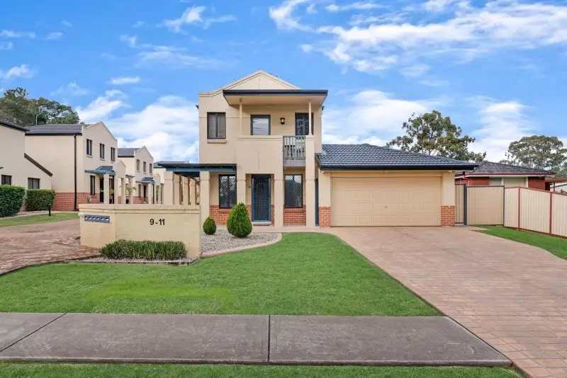 Main view of Homely townhouse listing, 1/9-11 Fourth Avenue, Macquarie Fields NSW 2564