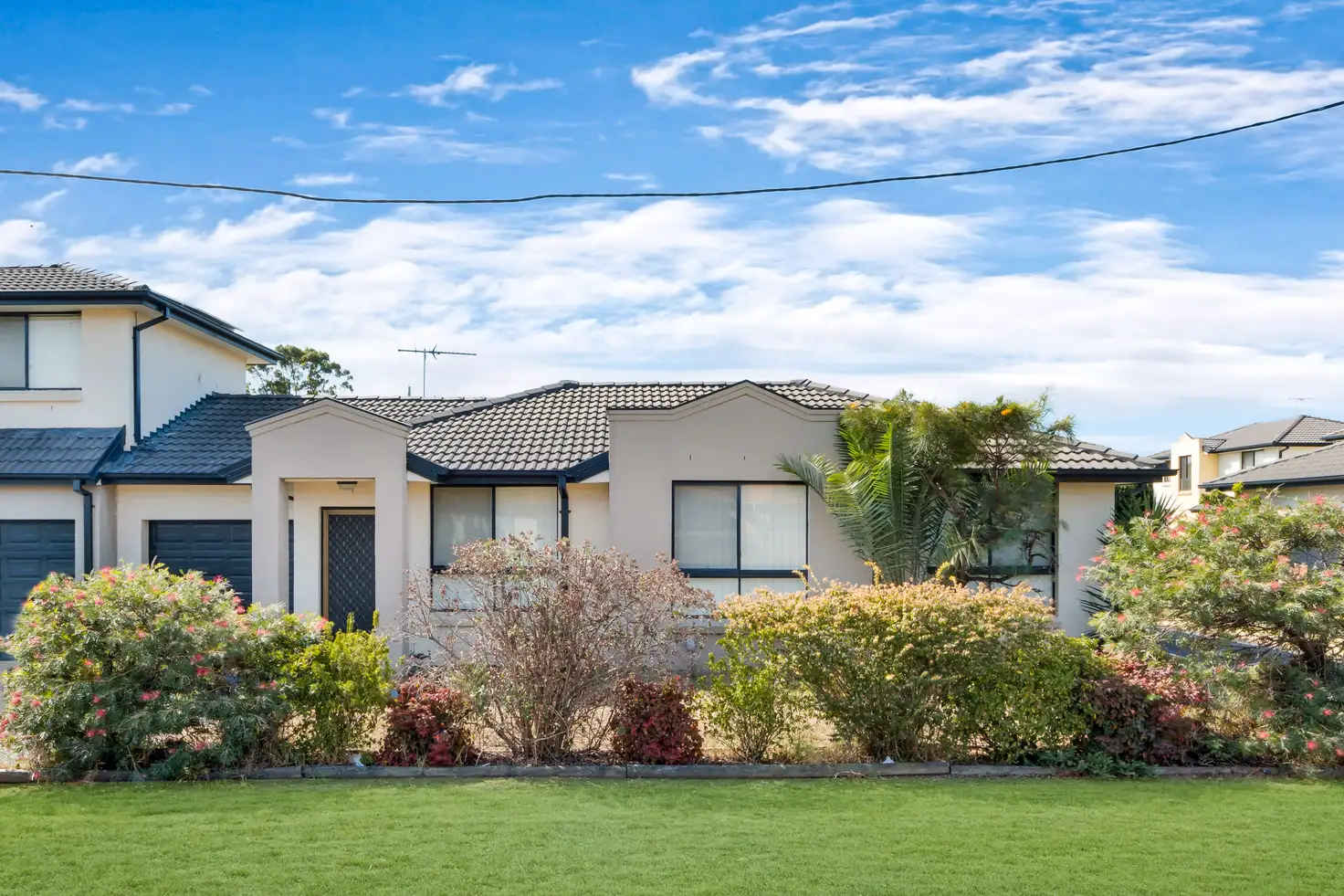 Main view of Homely villa listing, 2/75 Minto Road, Minto NSW 2566