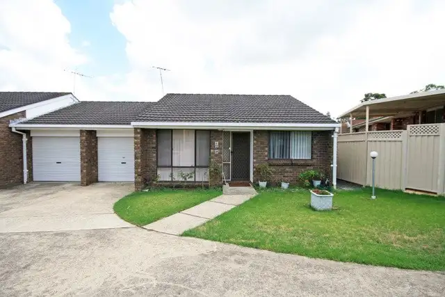 Main view of Homely villa listing, 9/16 Bensley Road, Macquarie Fields NSW 2564