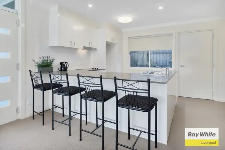 Second view of Homely townhouse listing, 1/73 Sovereign Circuit, Glenfield NSW 2167