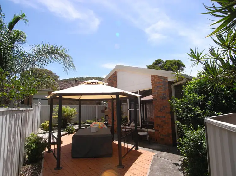 Main view of Homely villa listing, 2/49 Wairakei Rd, Wamberal NSW 2260